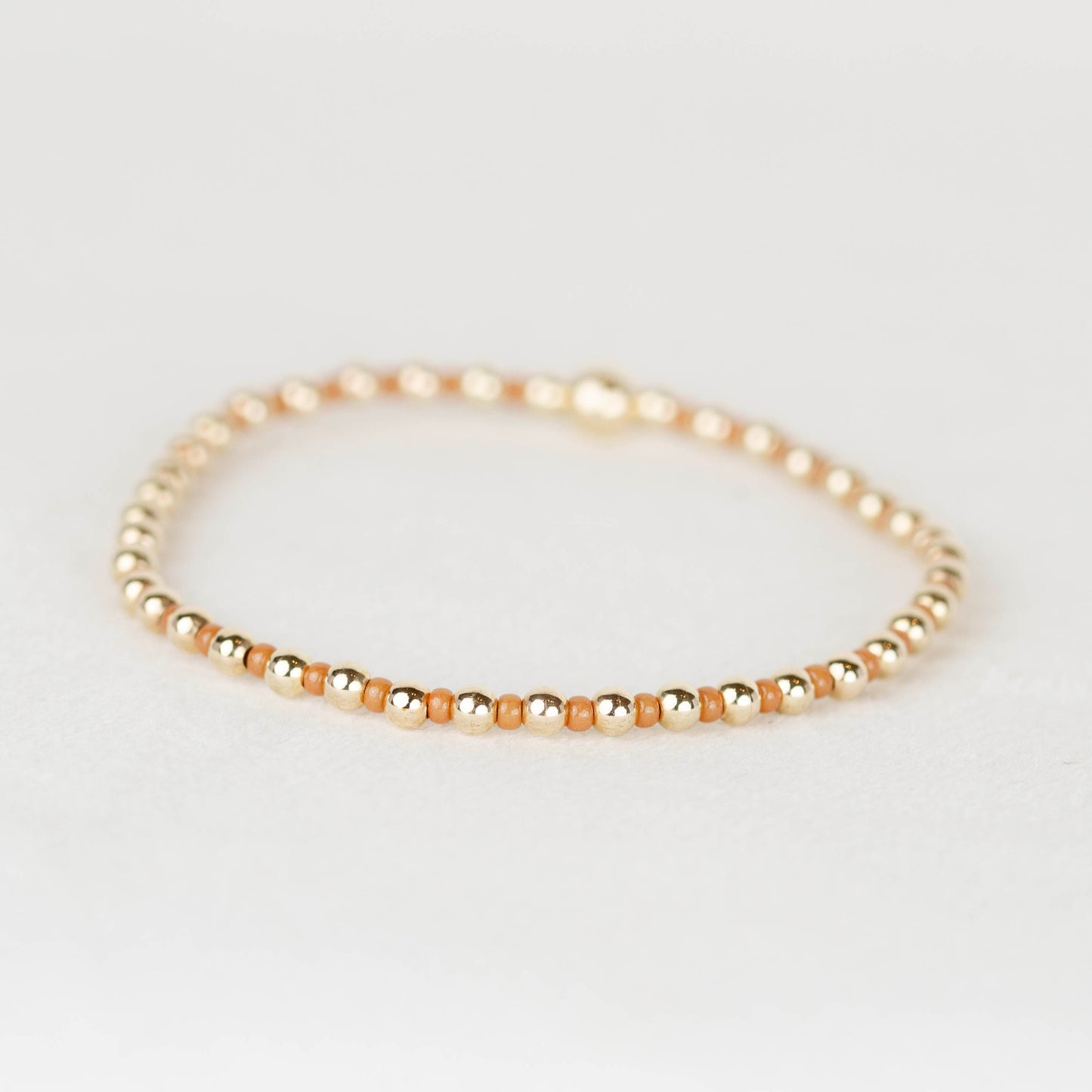 Tan nude Bella seed bead alternating with 14k gold filled or sterling silver beaded stretch bracelet