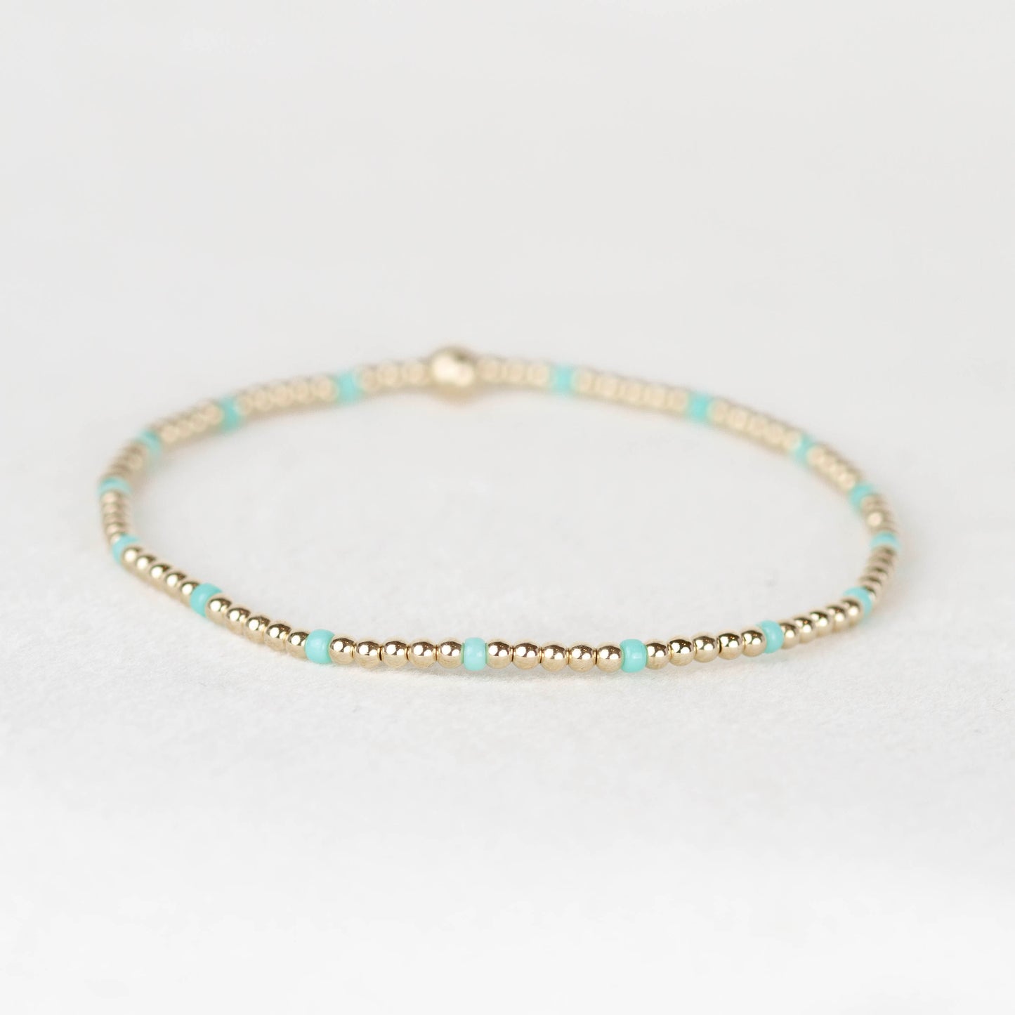 Aqua blue green Chloe seed bead and 14k gold filled or sterling silver beaded stretch bracelet 