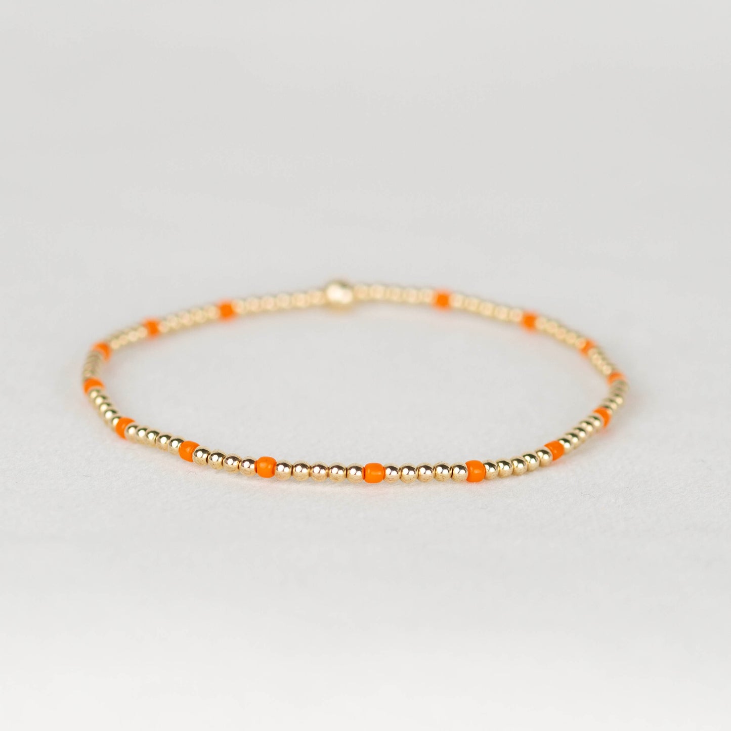 Orange Chloe seed bead and 14k gold filled or sterling silver beaded stretch bracelet 