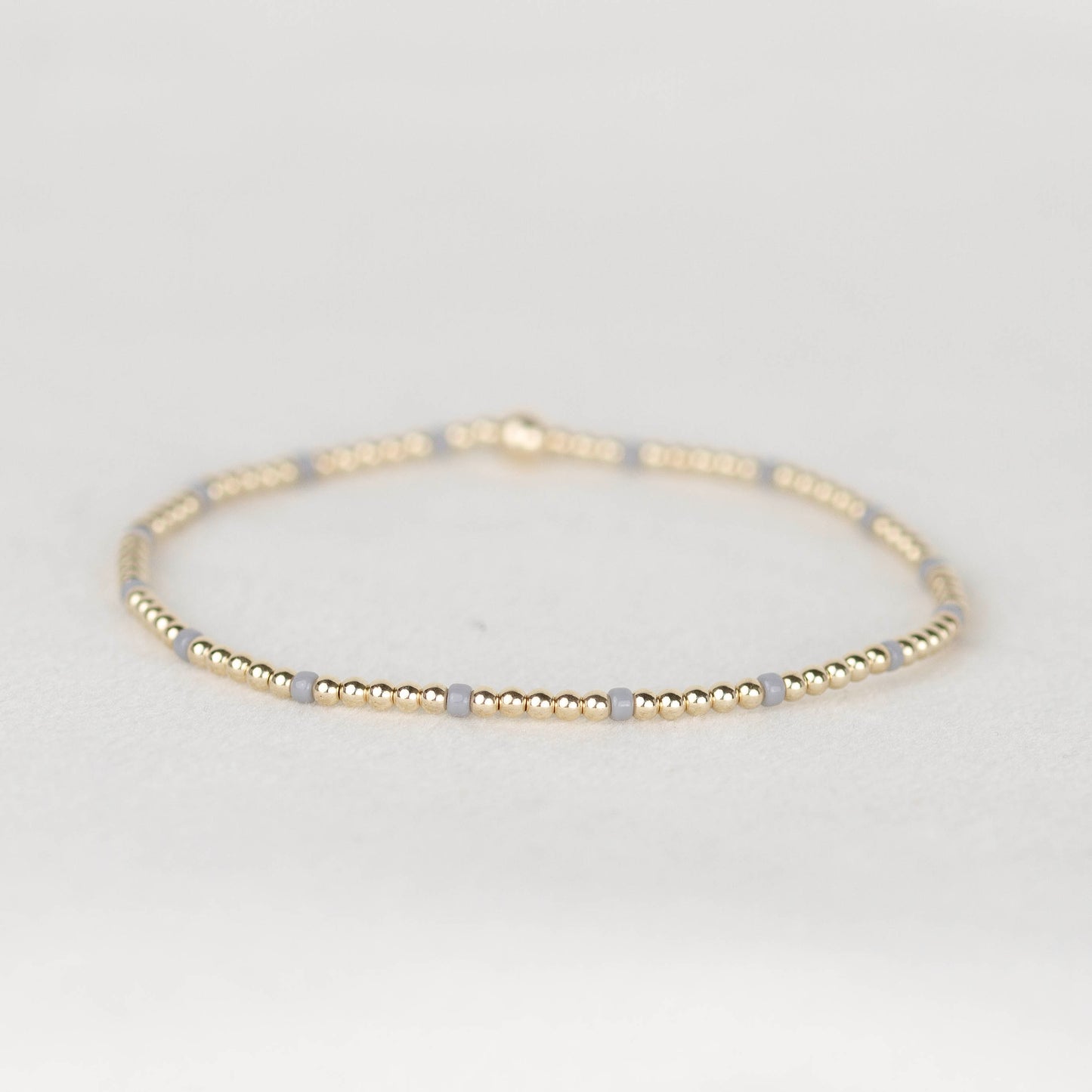 Light gray Chloe seed bead bracelet with 14k gold filled or sterling silver beaded stretch bracelet 
