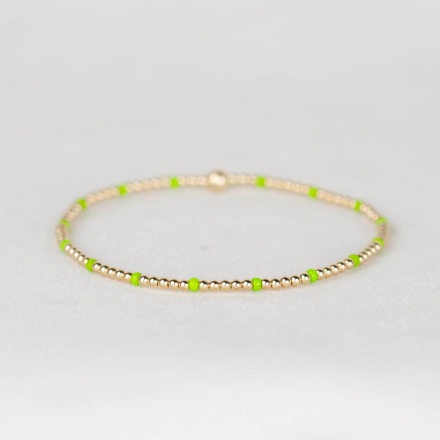 Neon lime green Chloe seed bead and 14k gold filled or sterling silver beaded stretch bracelet 