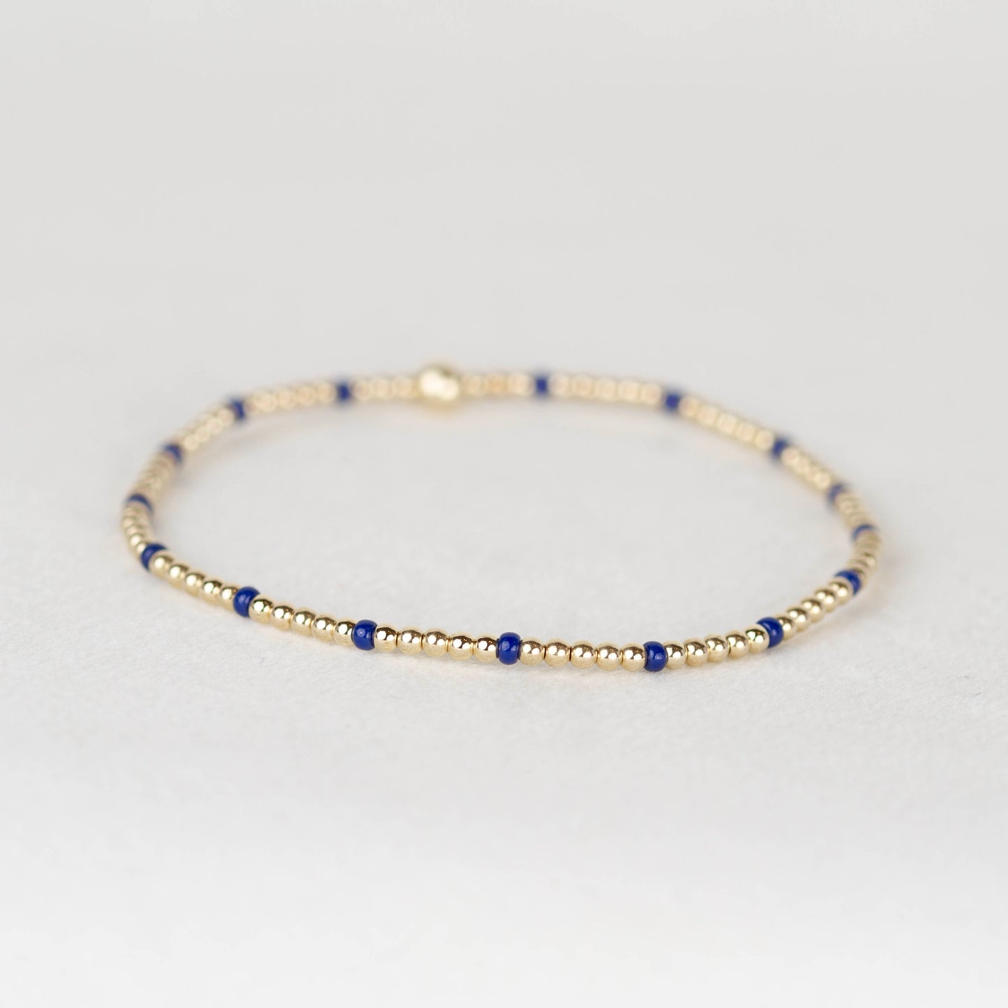 Dark navy blue Chloe seed bead and 14k gold filled or sterling silver beaded stretch bracelet 
