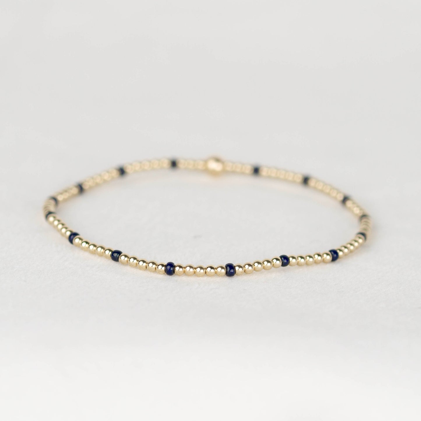 Dark midnight navy blue Chloe seed bead and 14k gold filled or sterling silver beaded stretch bracelet 