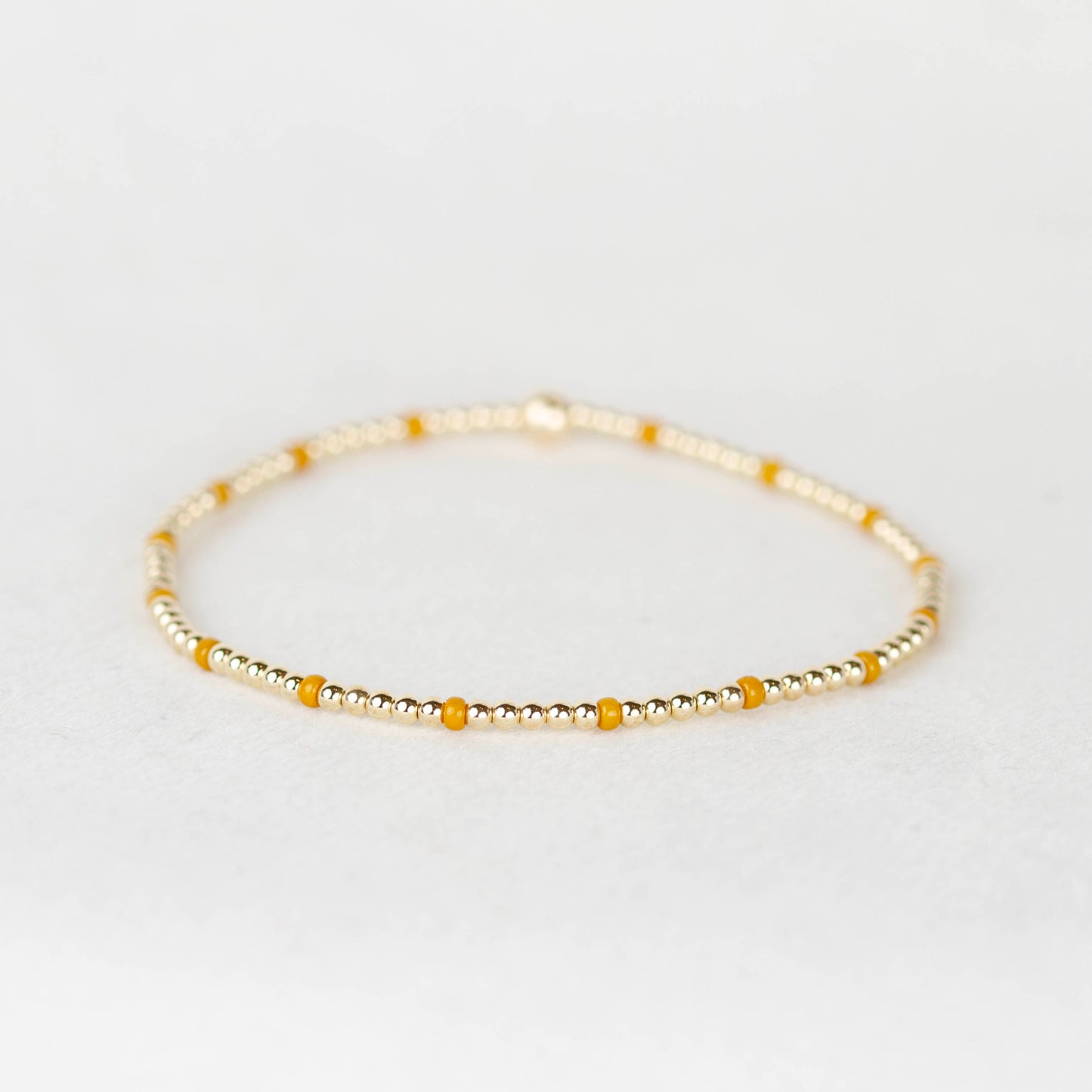 Mustard yellow Chloe seed bead and 14k gold filled or sterling silver beaded stretch bracelet 