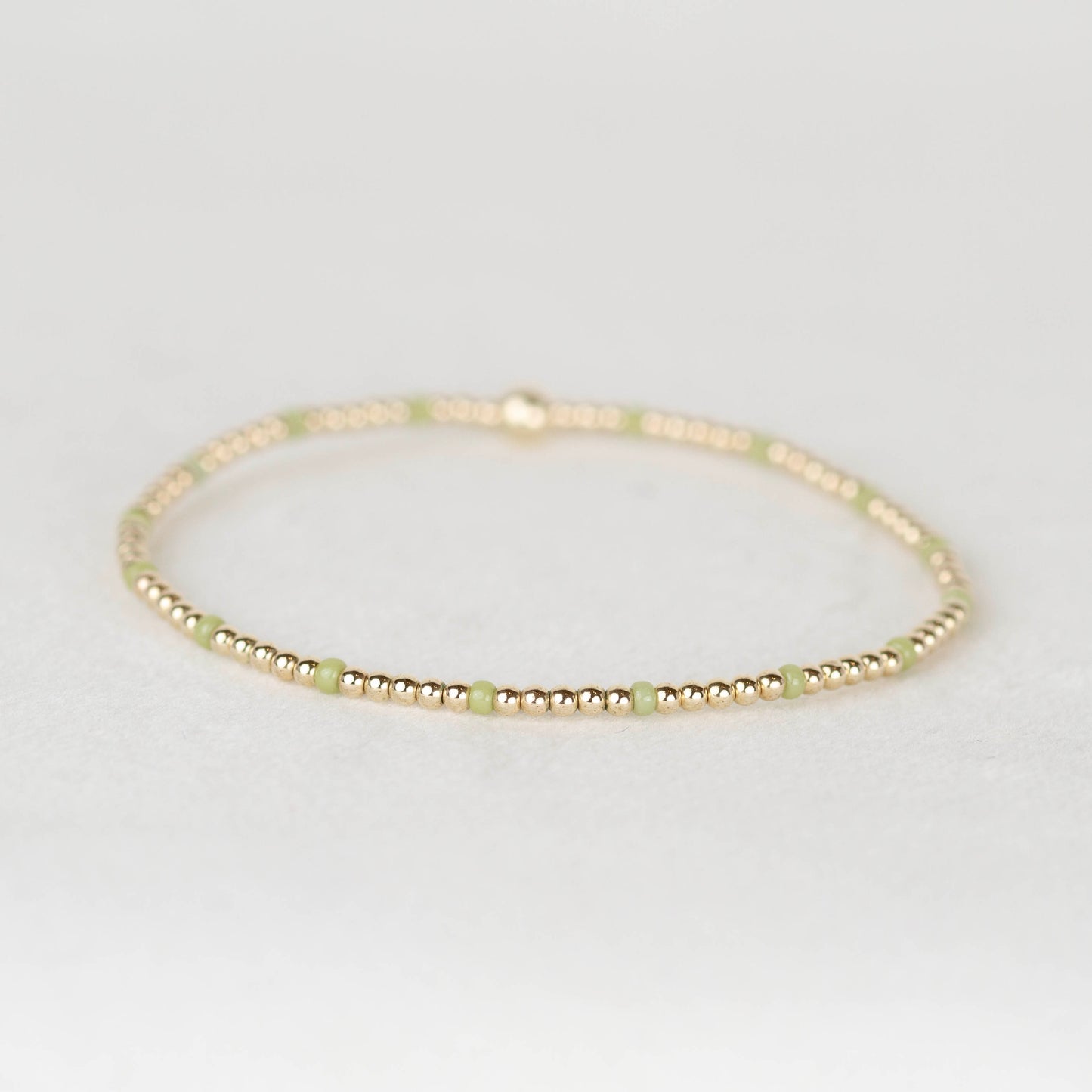 Olive light green Chloe seed bead and 14k gold filled or sterling silver beaded stretch bracelet 
