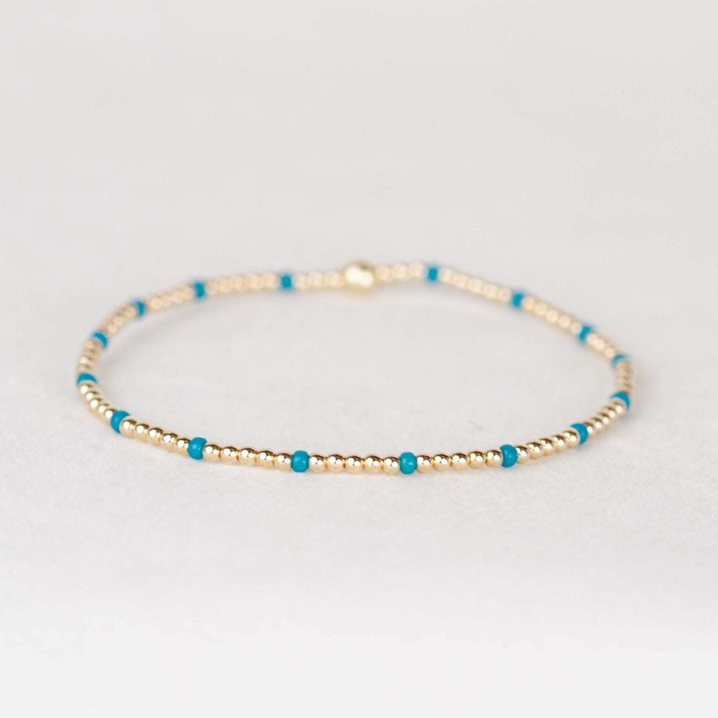 Peacock blue teal Chloe seed bead and 14k gold filled or sterling silver beaded stretch bracelet 