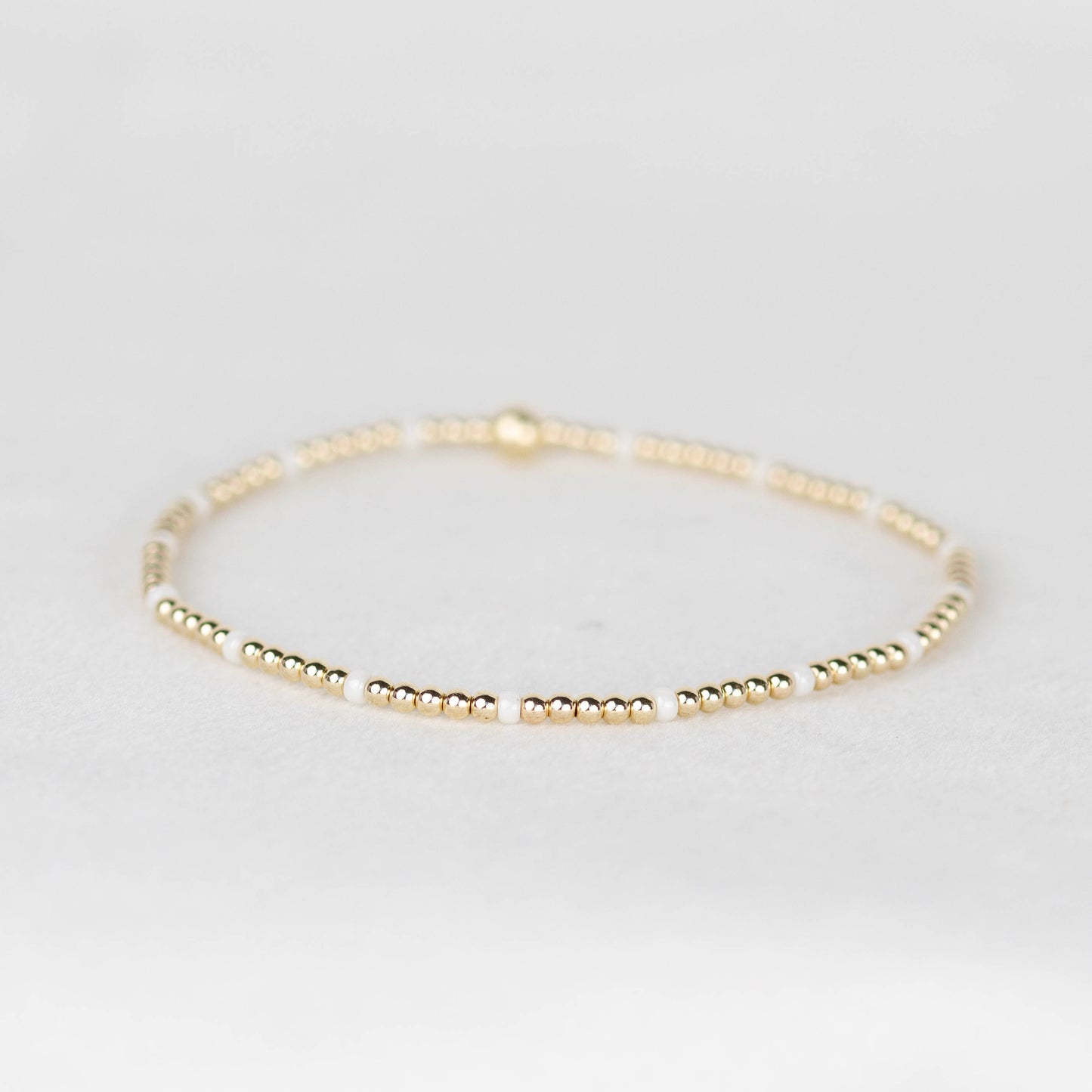 Pearl white Chloe seed bead bracelet with 14k gold filled or sterling silver beaded stretch bracelet 
