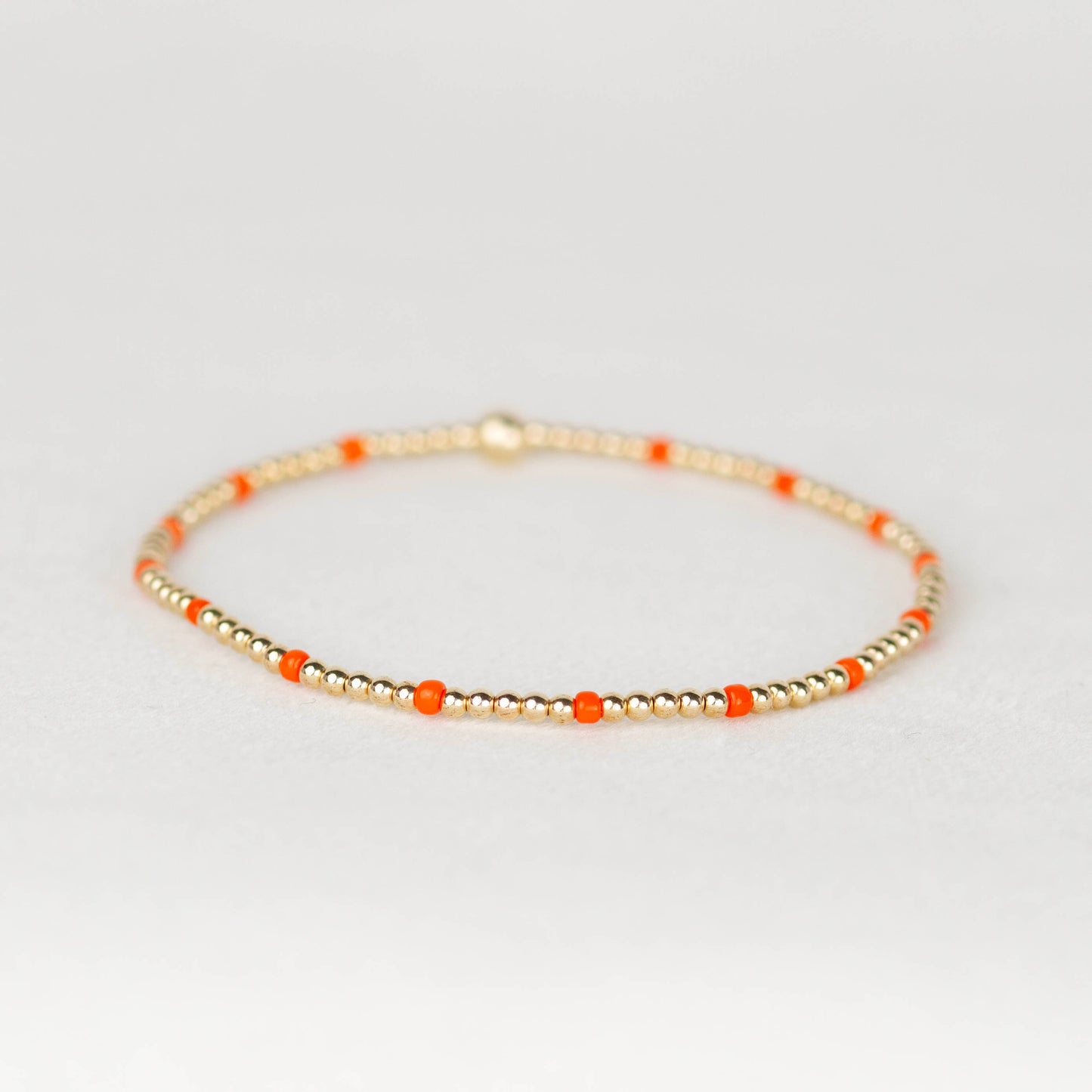 Dark orange Chloe seed bead and 14k gold filled or sterling silver beaded stretch bracelet 
