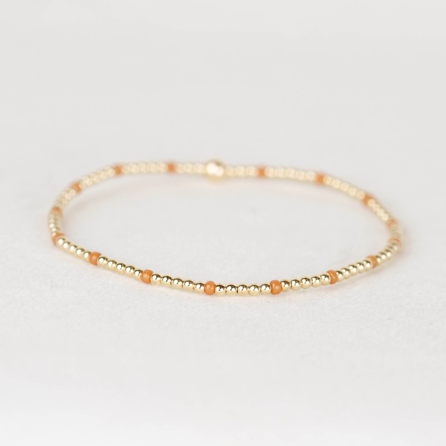 Tan golden brown Chloe seed bead and 14k gold filled or sterling silver beaded stretch bracelet 