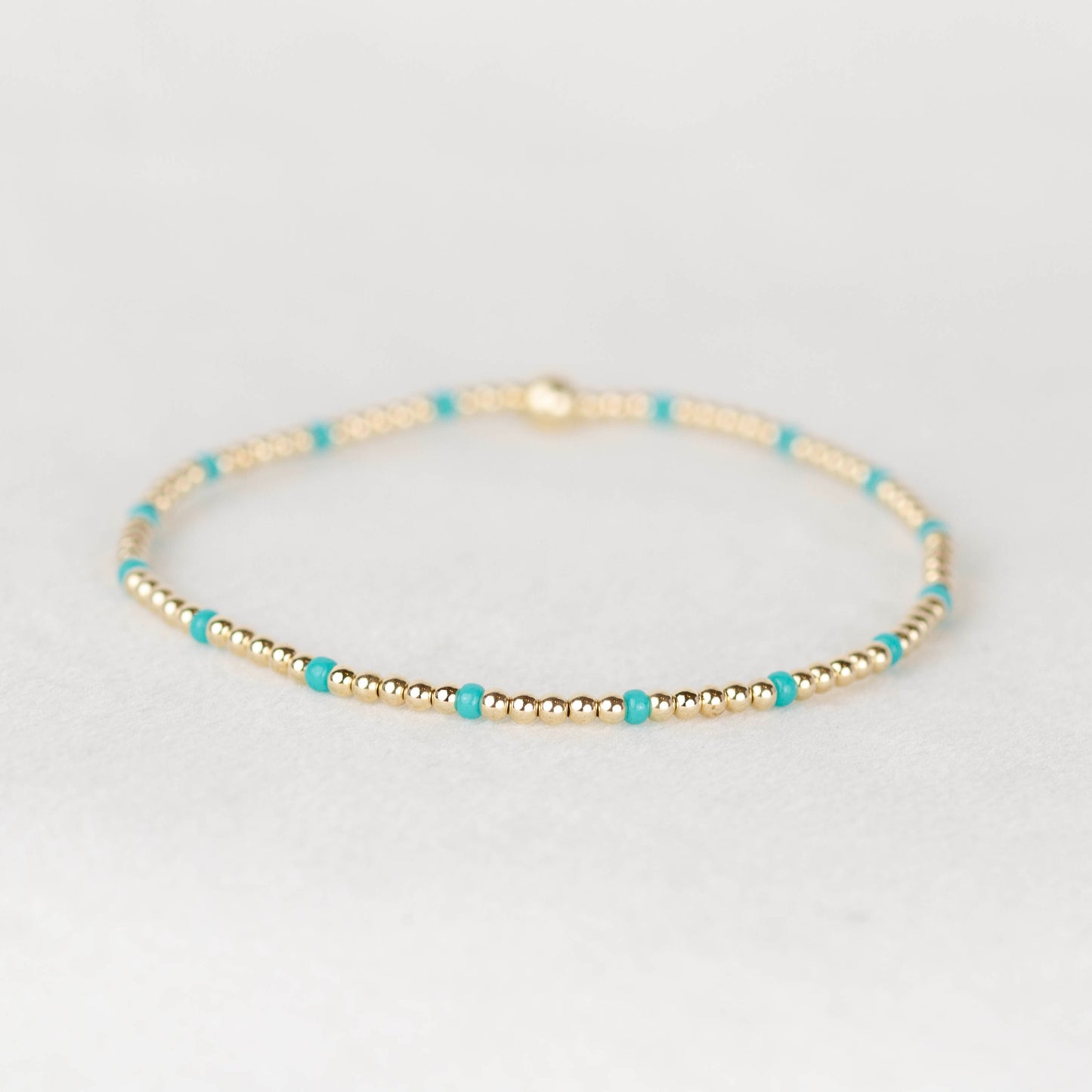 Turquoise blue green Chloe seed bead and 14k gold filled or sterling silver beaded stretch bracelet 