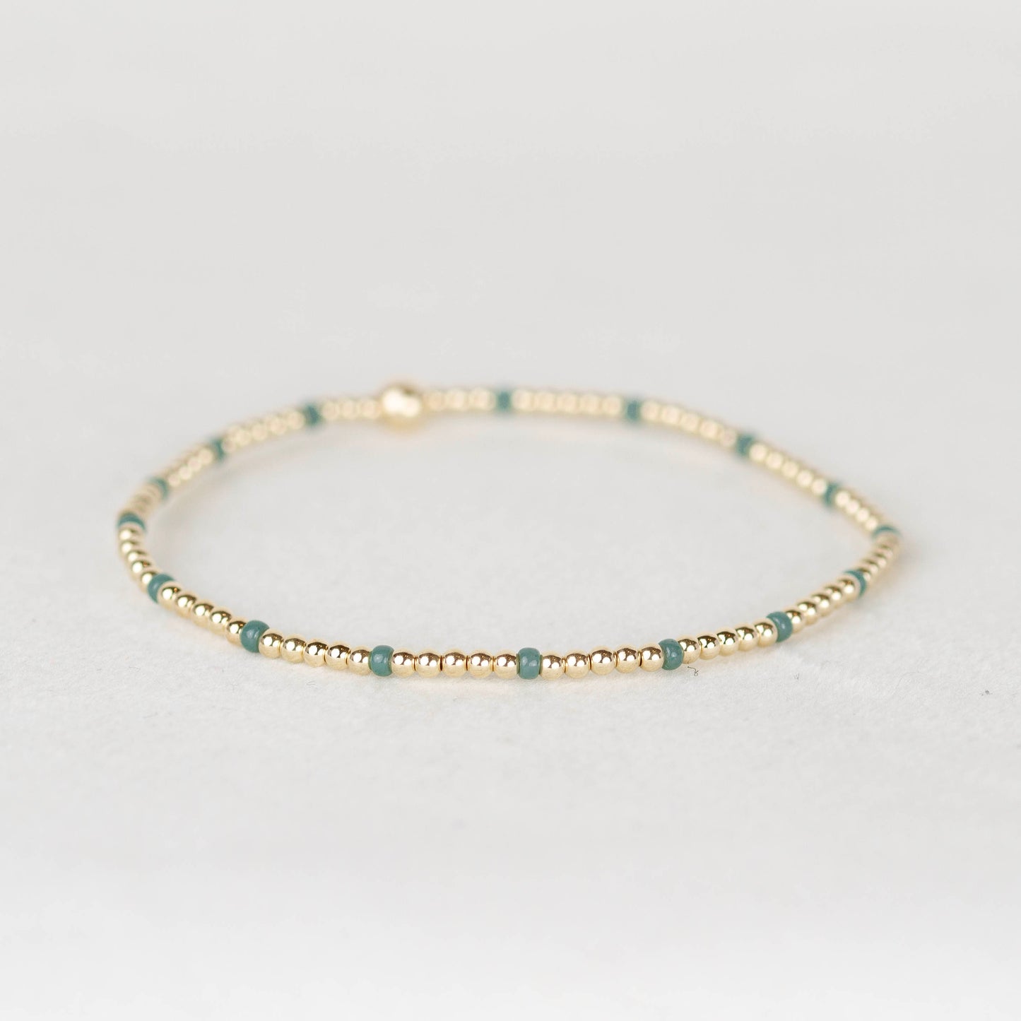 Dark muted green Chloe seed bead and 14k gold filled or sterling silver beaded stretch bracelet 