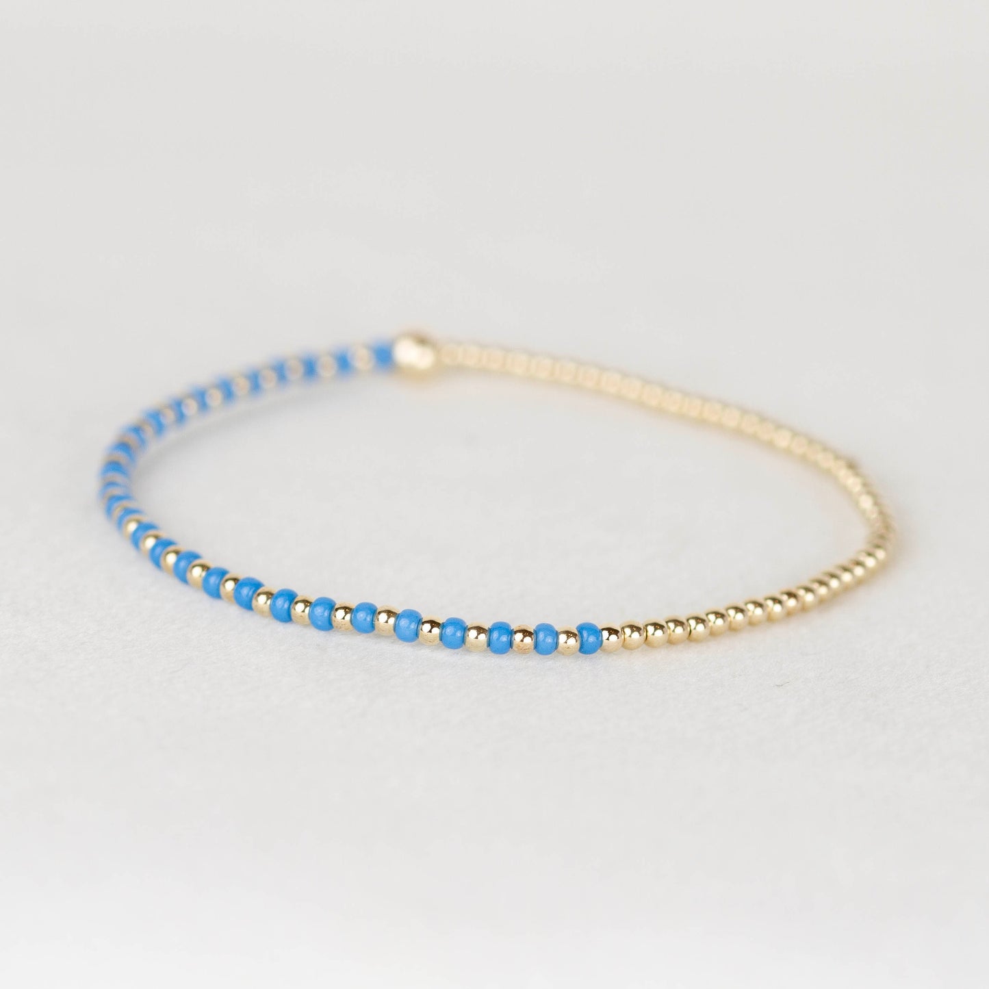 Blue Luna half seed bead half 14k gold filled or sterling silver beaded stretch bracelet 