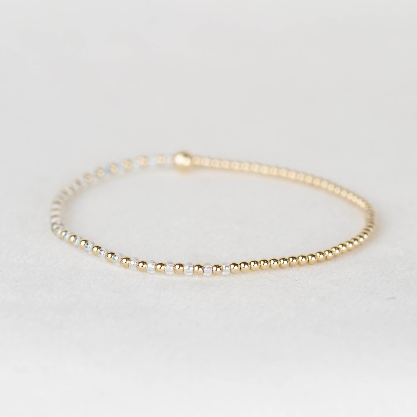 Clear iridescent Luna half seed bead half 14k gold filled or sterling silver beaded stretch bracelet 