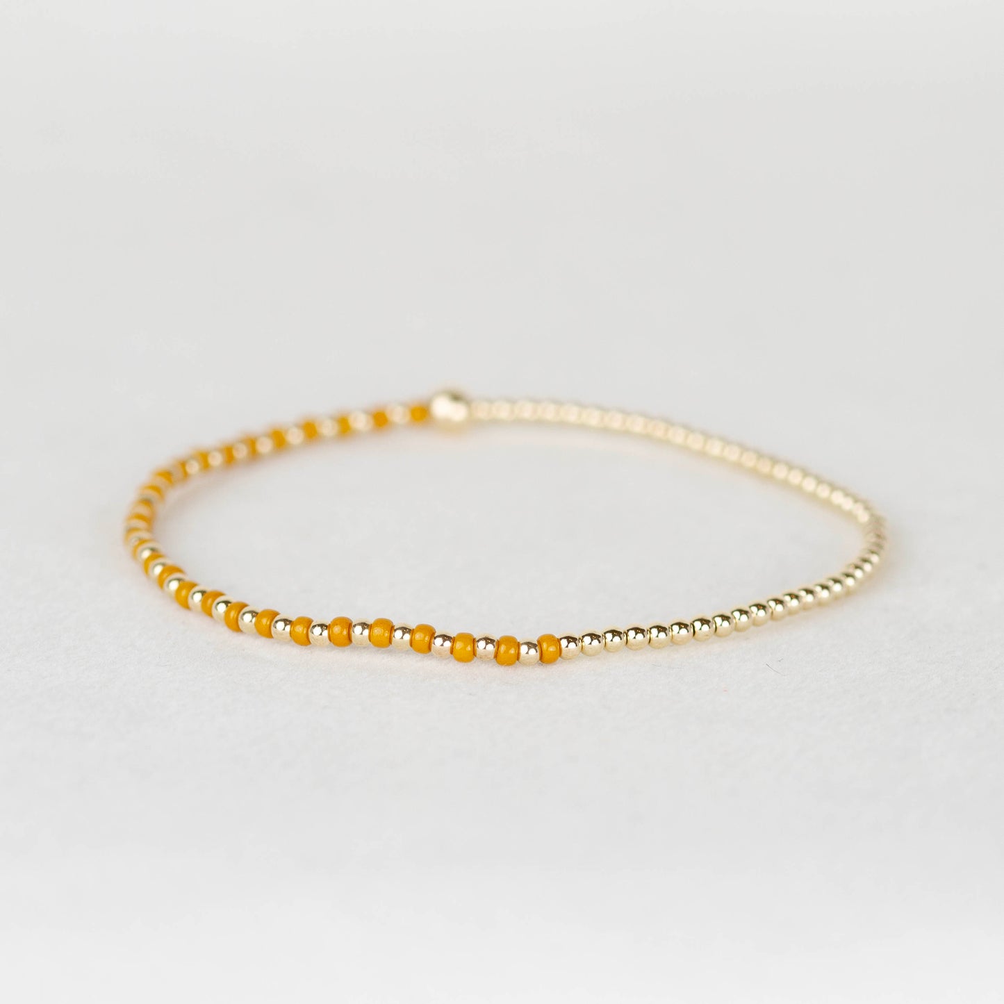 Dark mustard yellow Luna half seed bead half 14k gold filled or sterling silver beaded stretch bracelet 