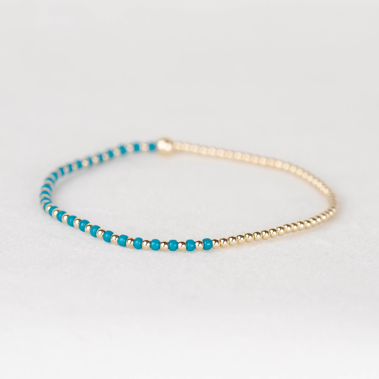 Peacock teal blue Luna half seed bead half 14k gold filled or sterling silver beaded stretch bracelet 