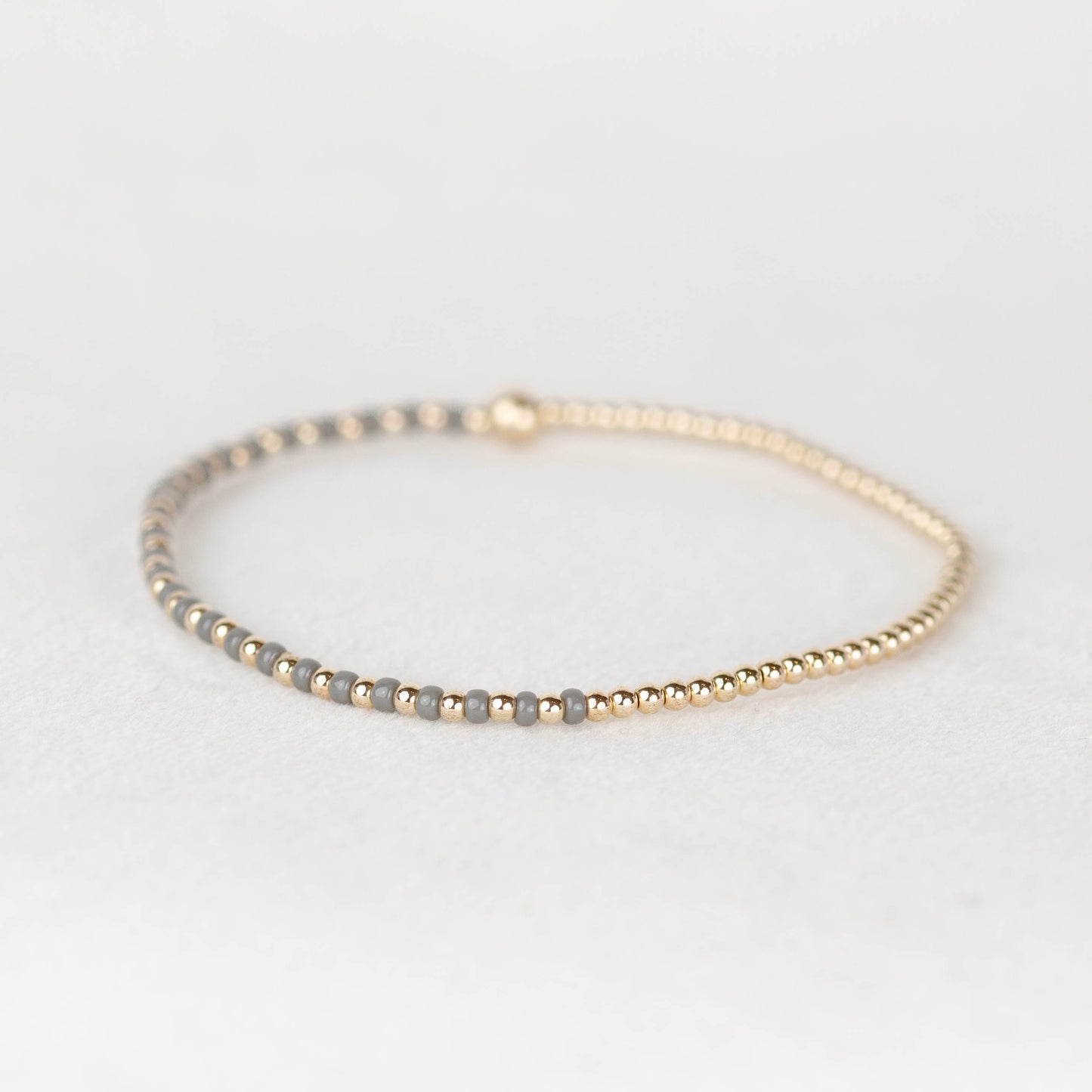 Dark gray Luna half seed bead half 14k gold filled or sterling silver beaded stretch bracelet 