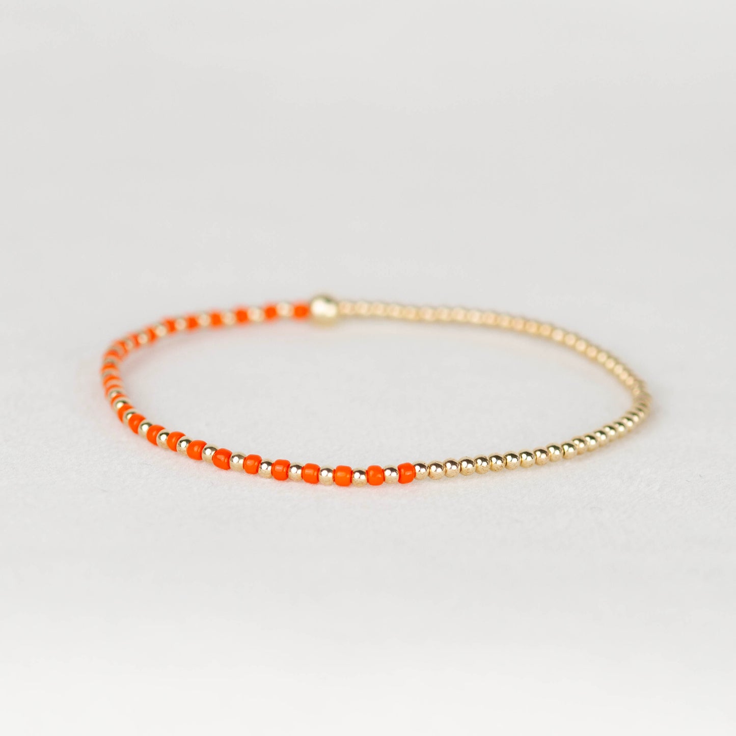 dark orange Luna half seed bead half 14k gold filled or sterling silver beaded stretch bracelet 