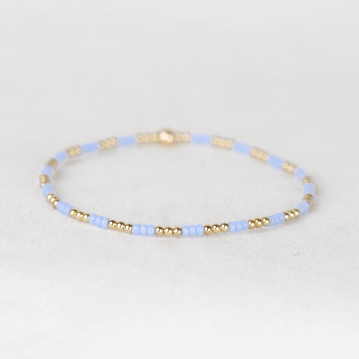 Carolina light blue Madi seed bead alternating with 14k gold filled or sterling silver beaded stretch bracelet 