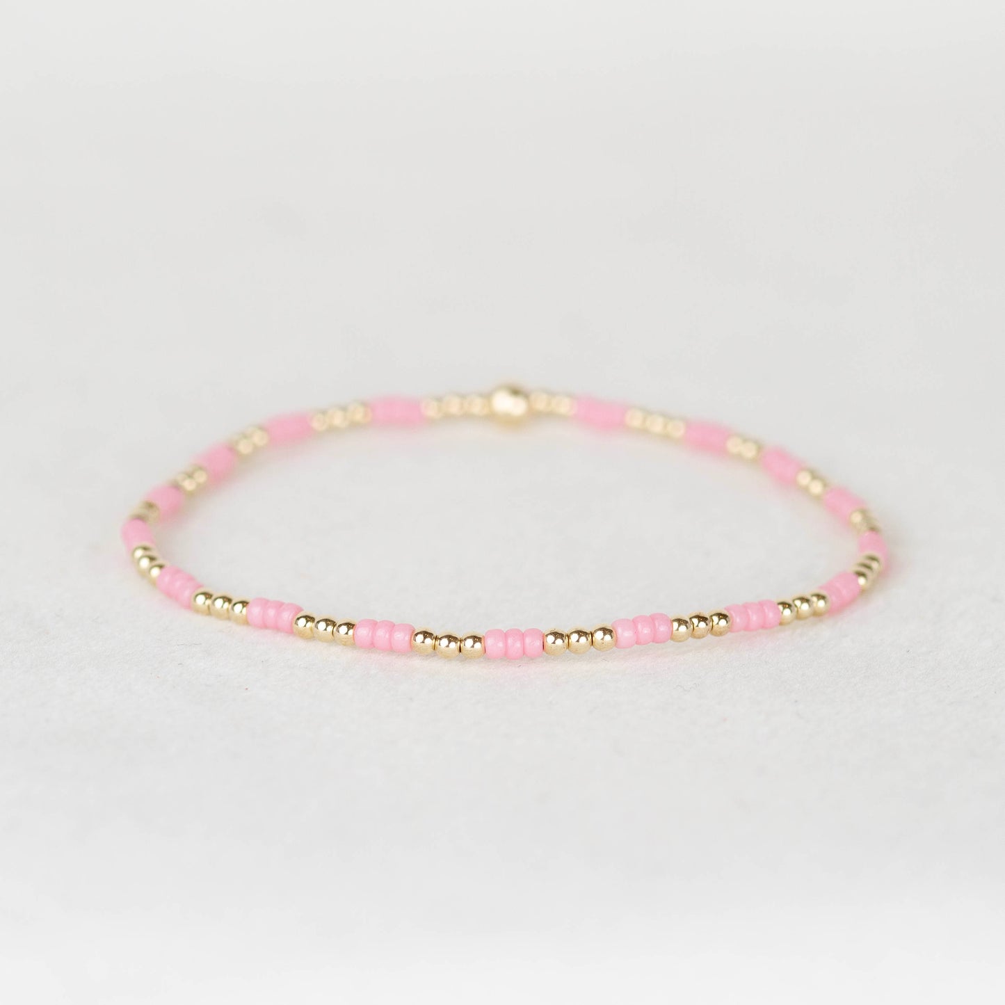 Light pink Madi seed beads and 14k gold filled or sterling silver beaded stretch bracelet
