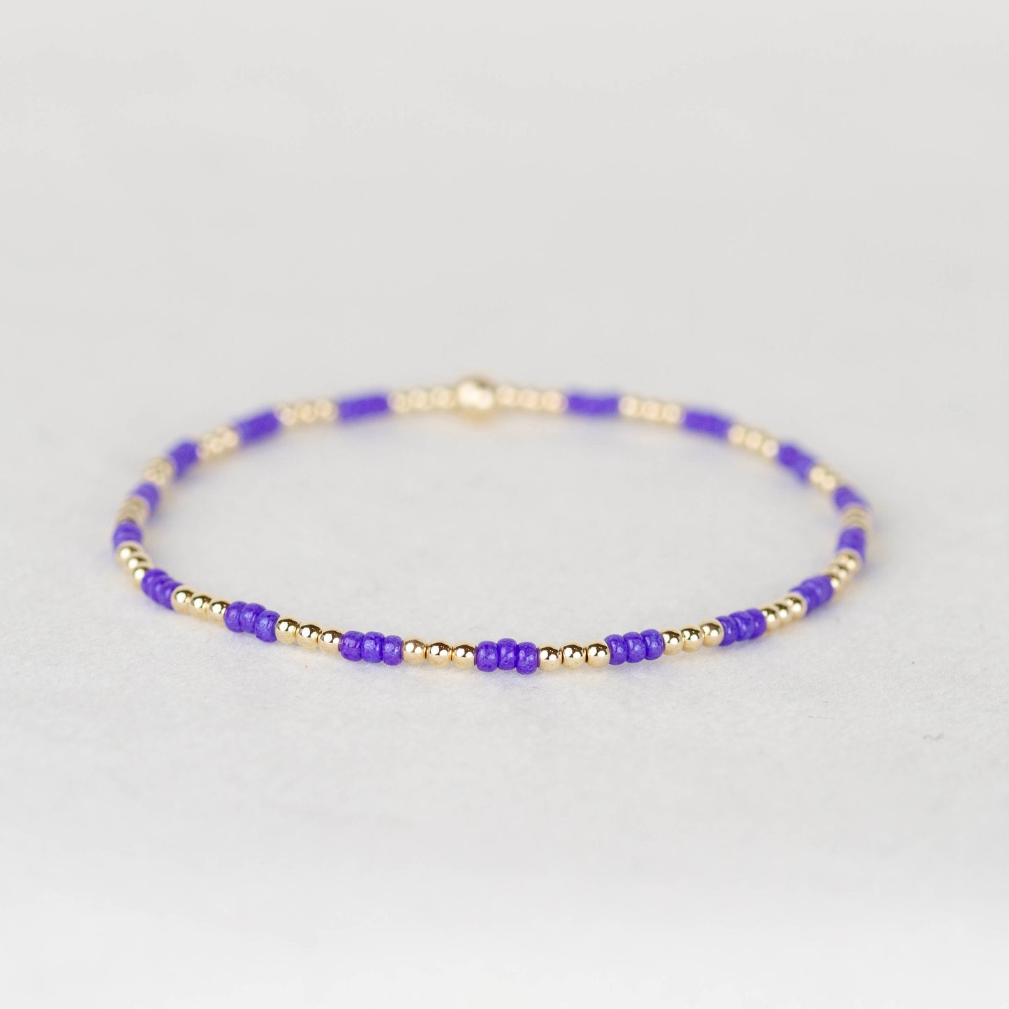 Grape bright purple Madi seed bead alternating with 14k gold filled or sterling silver beaded stretch bracelet 