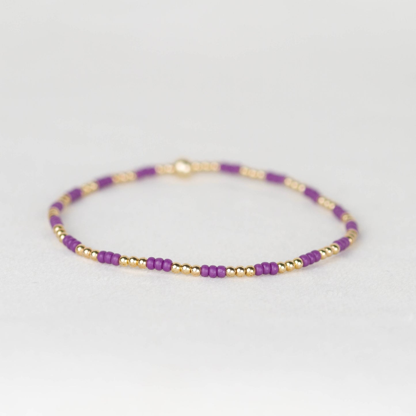 Dark violet purple Madi seed bead alternating with 14k gold filled or sterling silver beaded stretch bracelet 
