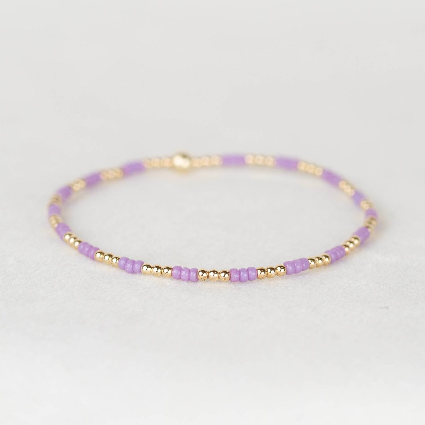 Lavender light purple Madi seed bead alternating with 14k gold filled or sterling silver beaded stretch bracelet 