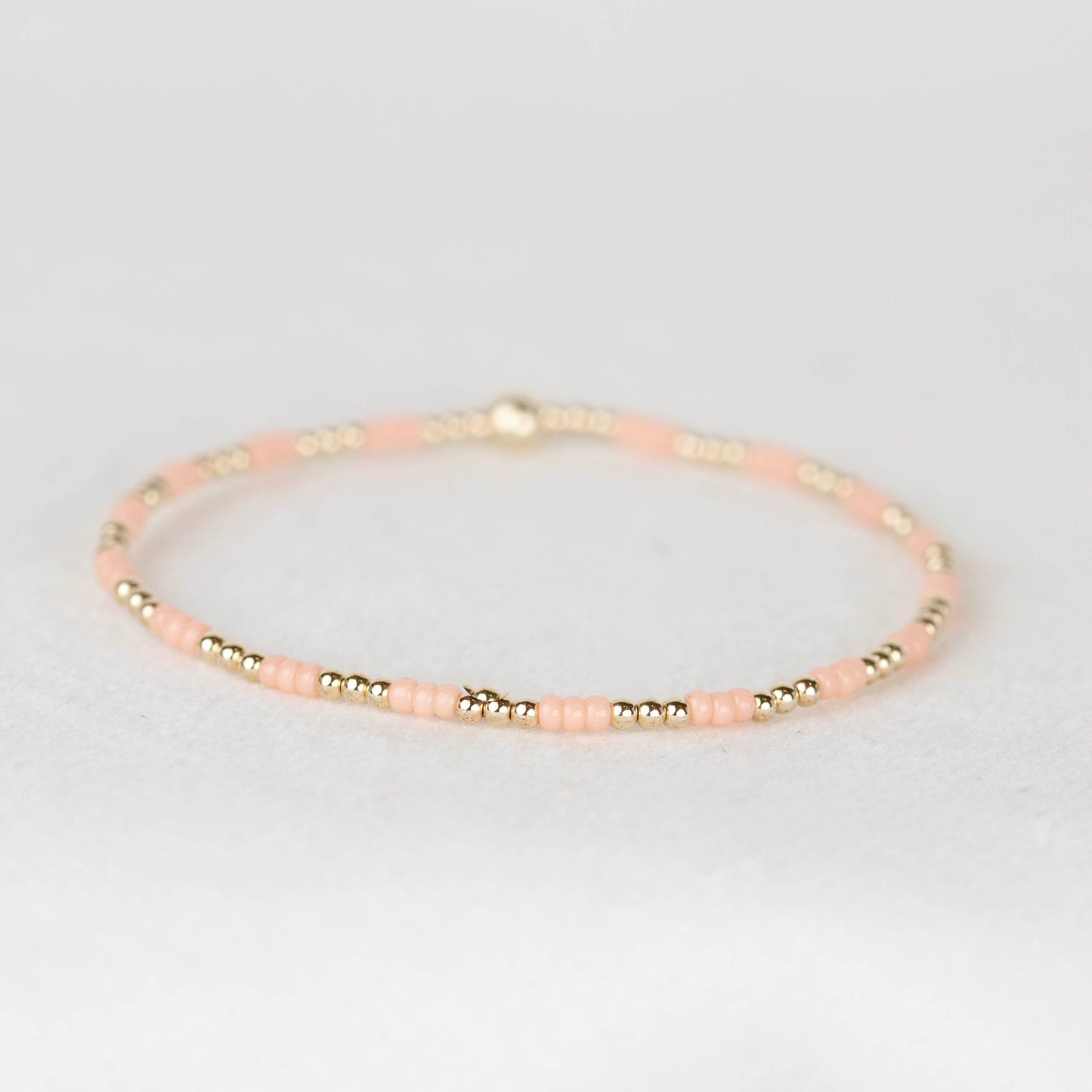 Peach Madi seed bead bracelet with 14k gold filled or sterling silver beaded stretch bracelet