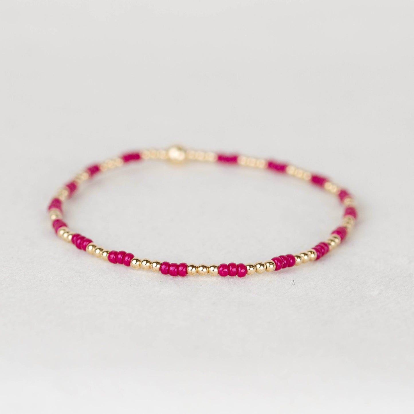 Bold pink Madi seed beads and 14k gold filled or sterling silver beaded stretch bracelet
