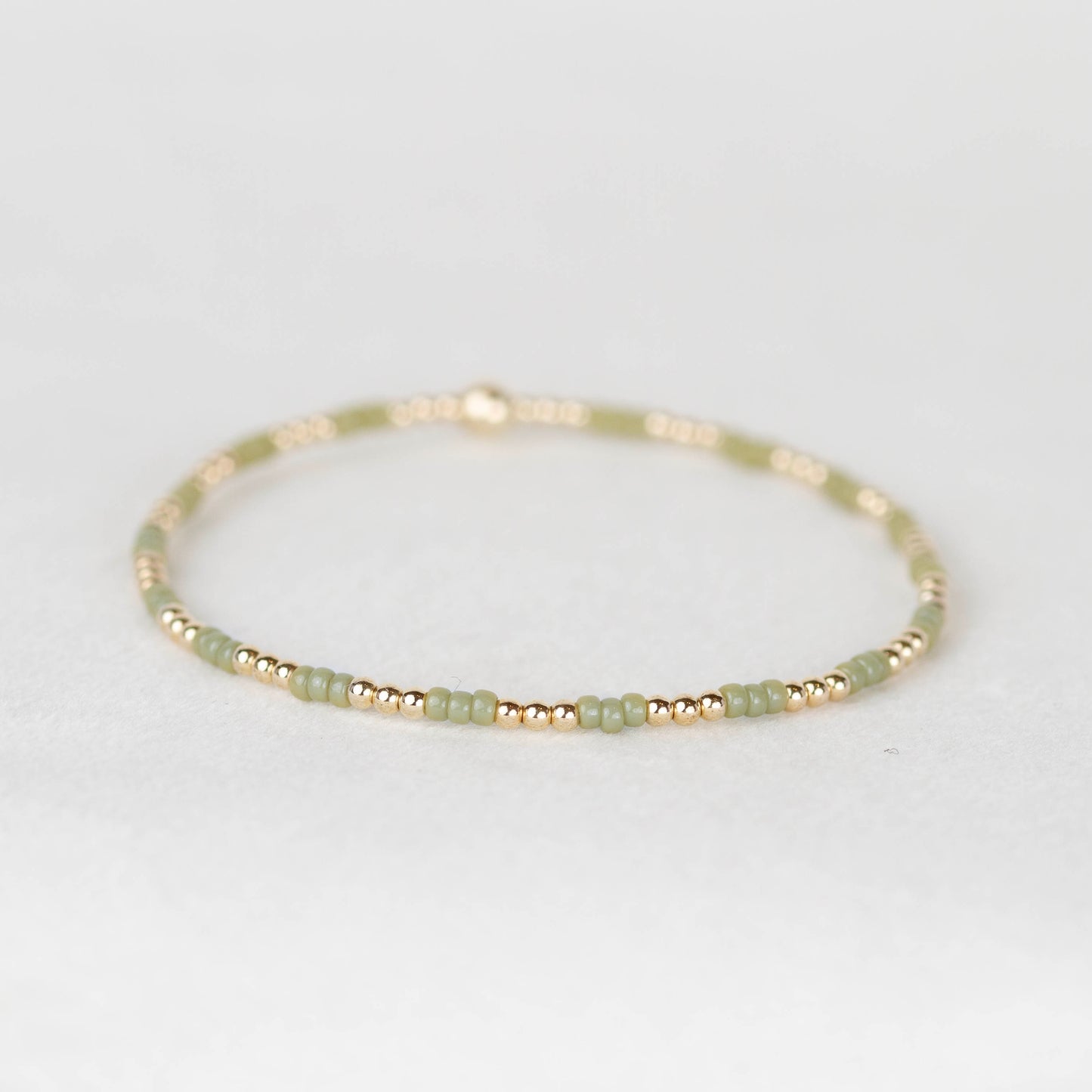 Sage green Madi seed bead alternating with 14k gold filled or sterling silver beaded stretch bracelet 