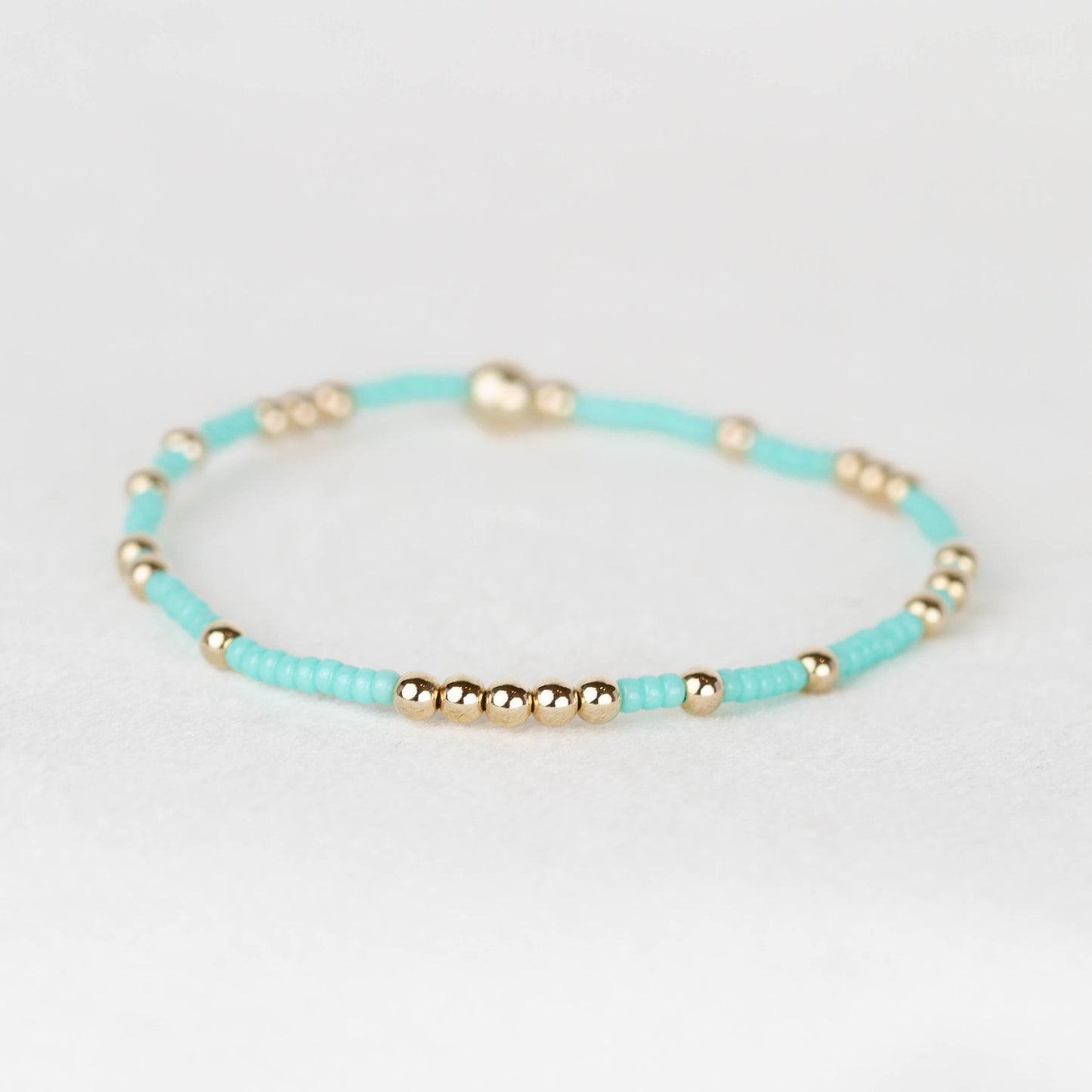 aqua turquoise Olivia seed bead with scattered 14k gold filled or sterling silver beaded stretch bracelet 