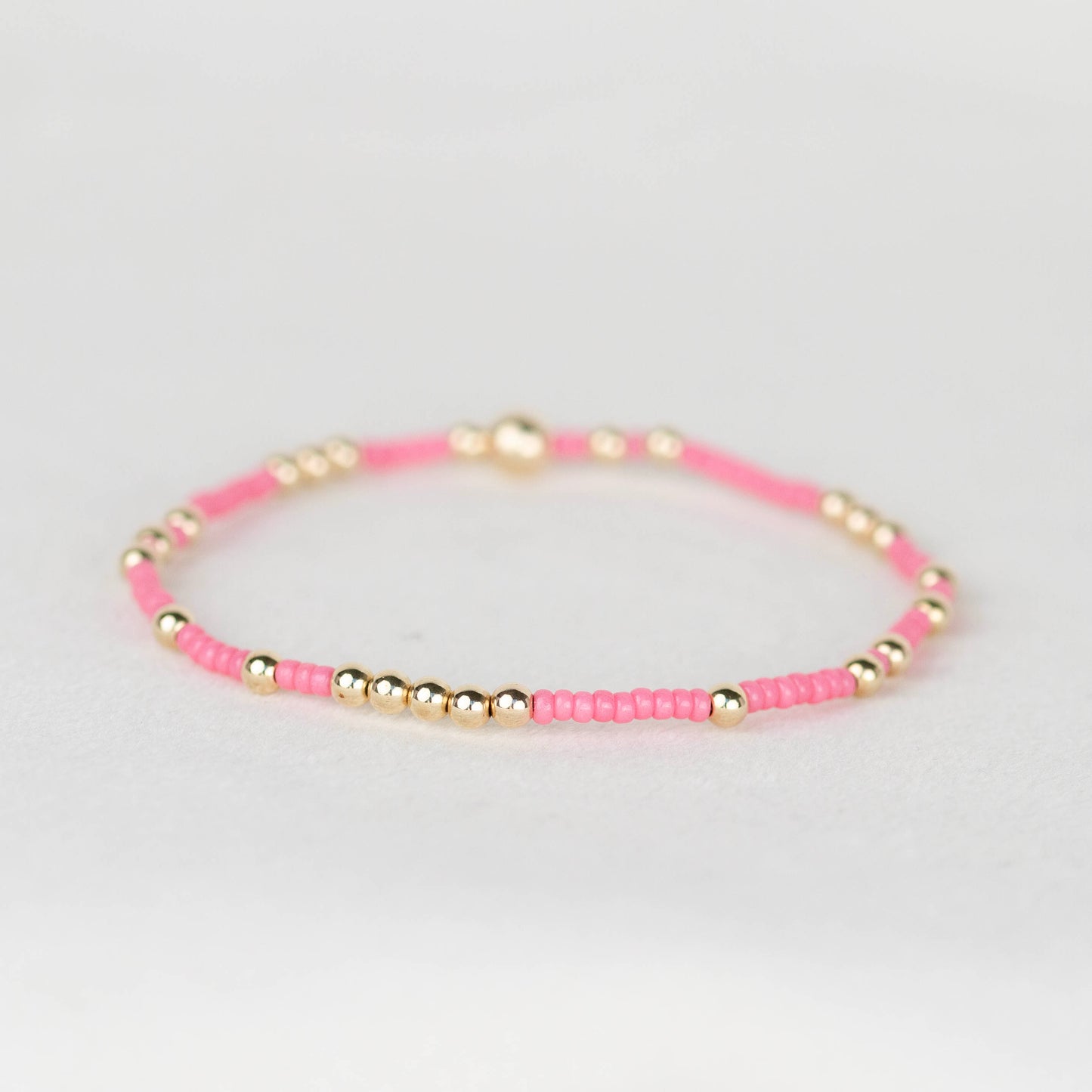 Bubble gum pink Olivia seed bead with scattered 14k gold filled or sterling silver beaded stretch bracelet 