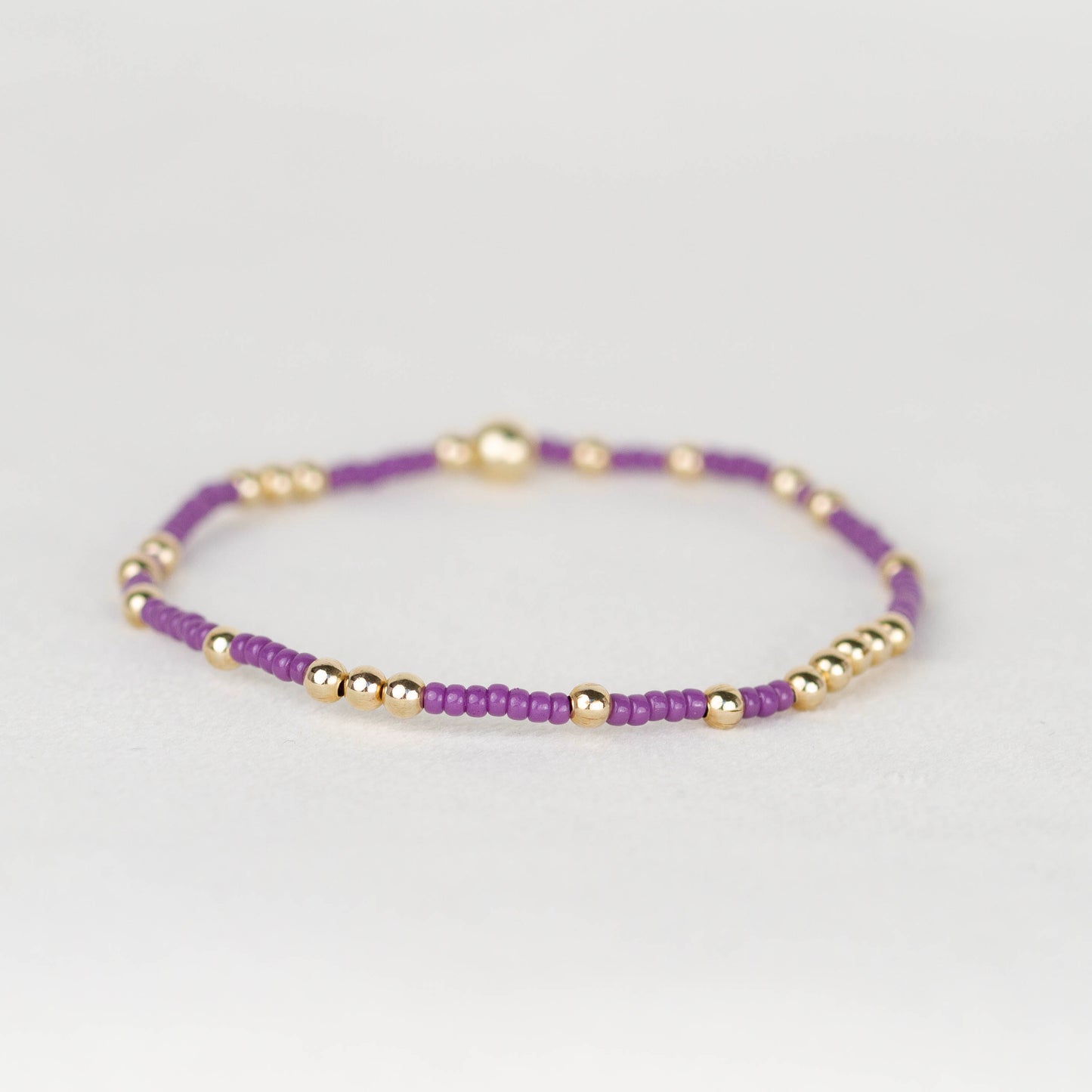 Dark purple Olivia seed bead scattered with 14k gold filled or sterling silver beaded stretch bracelet 