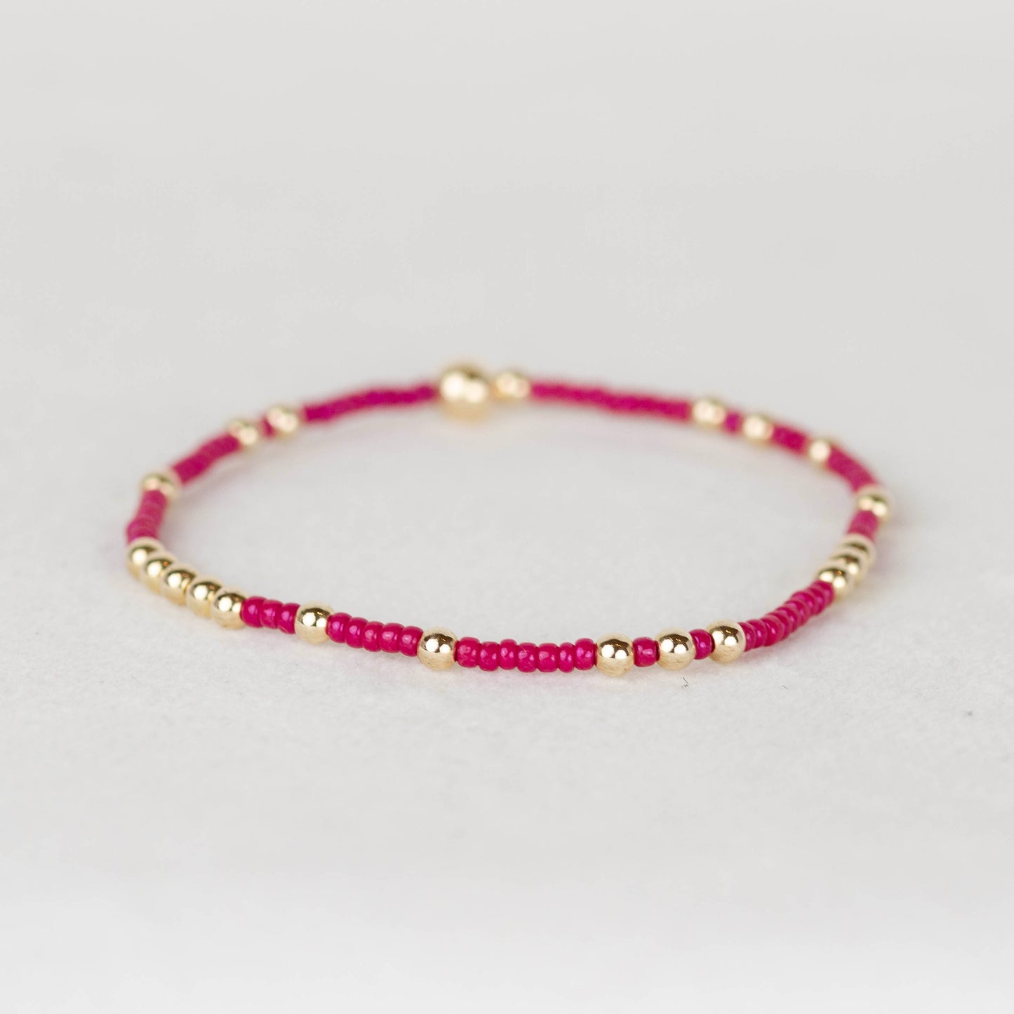Dark pink Chloe seed bead and 14k gold filled or sterling silver beaded stretch bracelet 