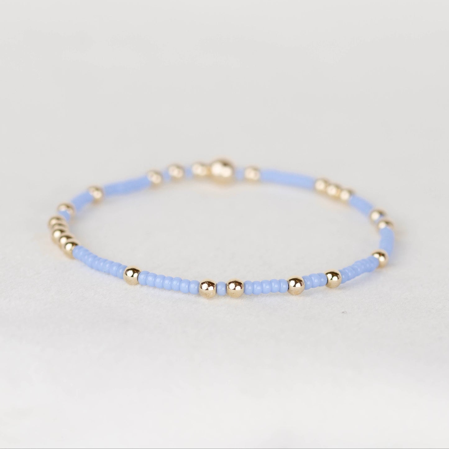 light blue Olivia seed bead with scattered 14k gold filled or sterling silver beaded stretch bracelet 