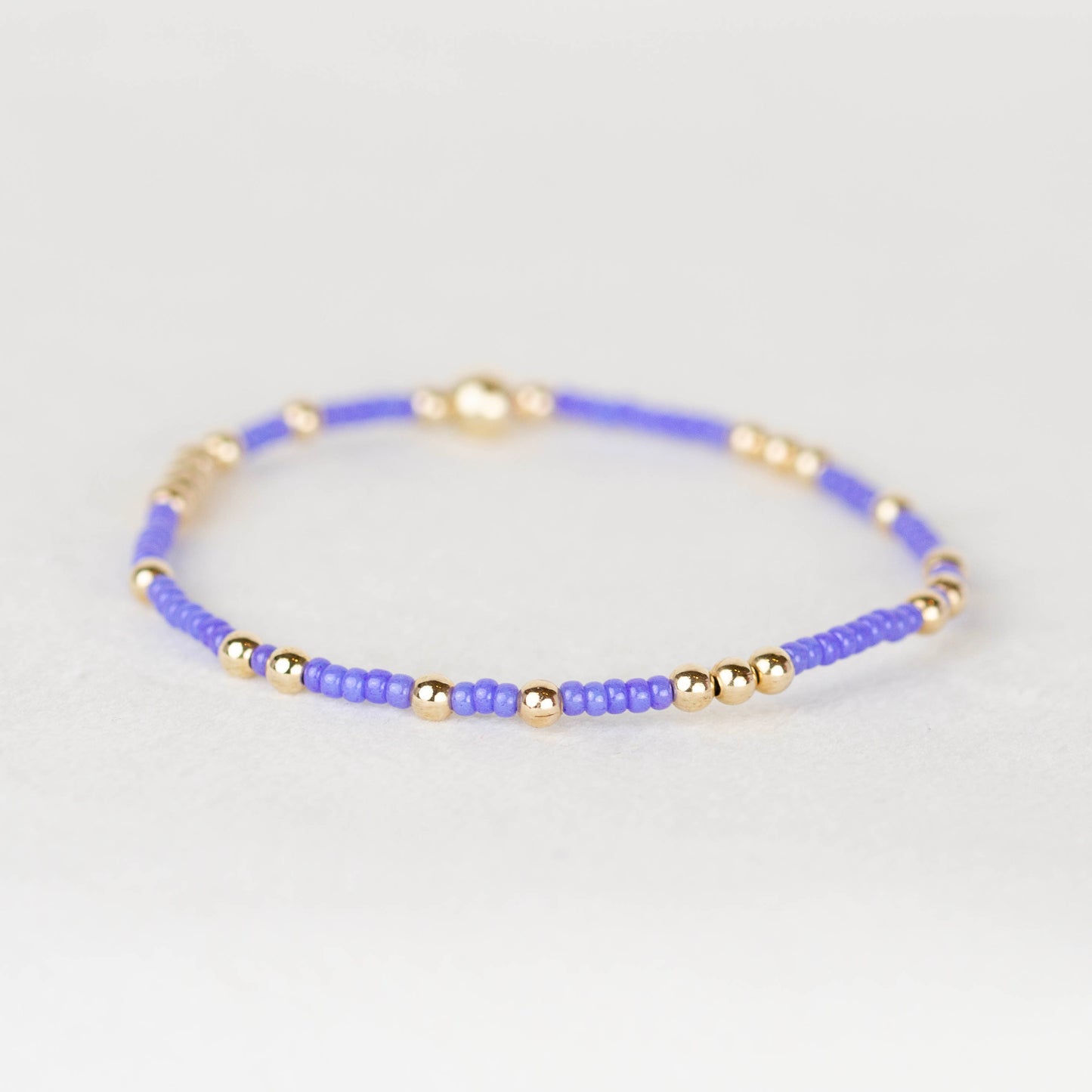 Purple Olivia seed bead with scattered 14k gold filled or sterling silver beaded stretch bracelet 