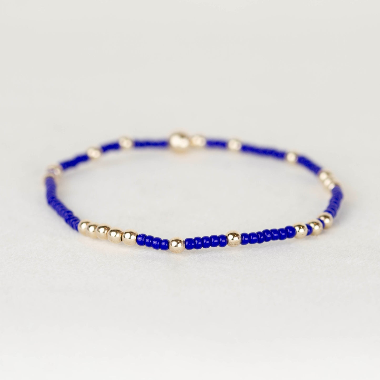 cobalt blue Olivia seed bead with scattered 14k gold filled or sterling silver beaded stretch bracelet 
