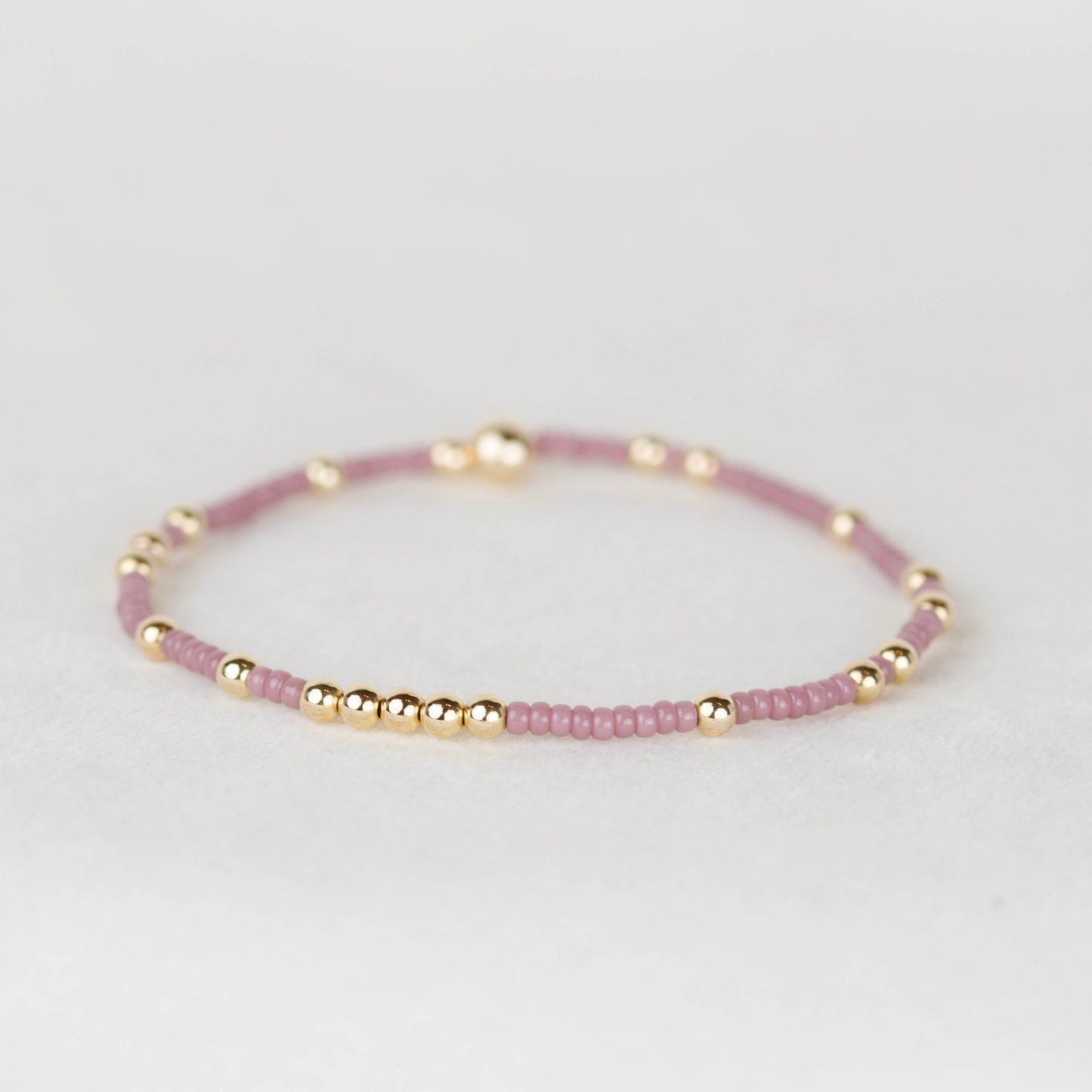 Muted Lavender Olivia seed bead with scattered 14k gold filled or sterling silver beaded stretch bracelet 