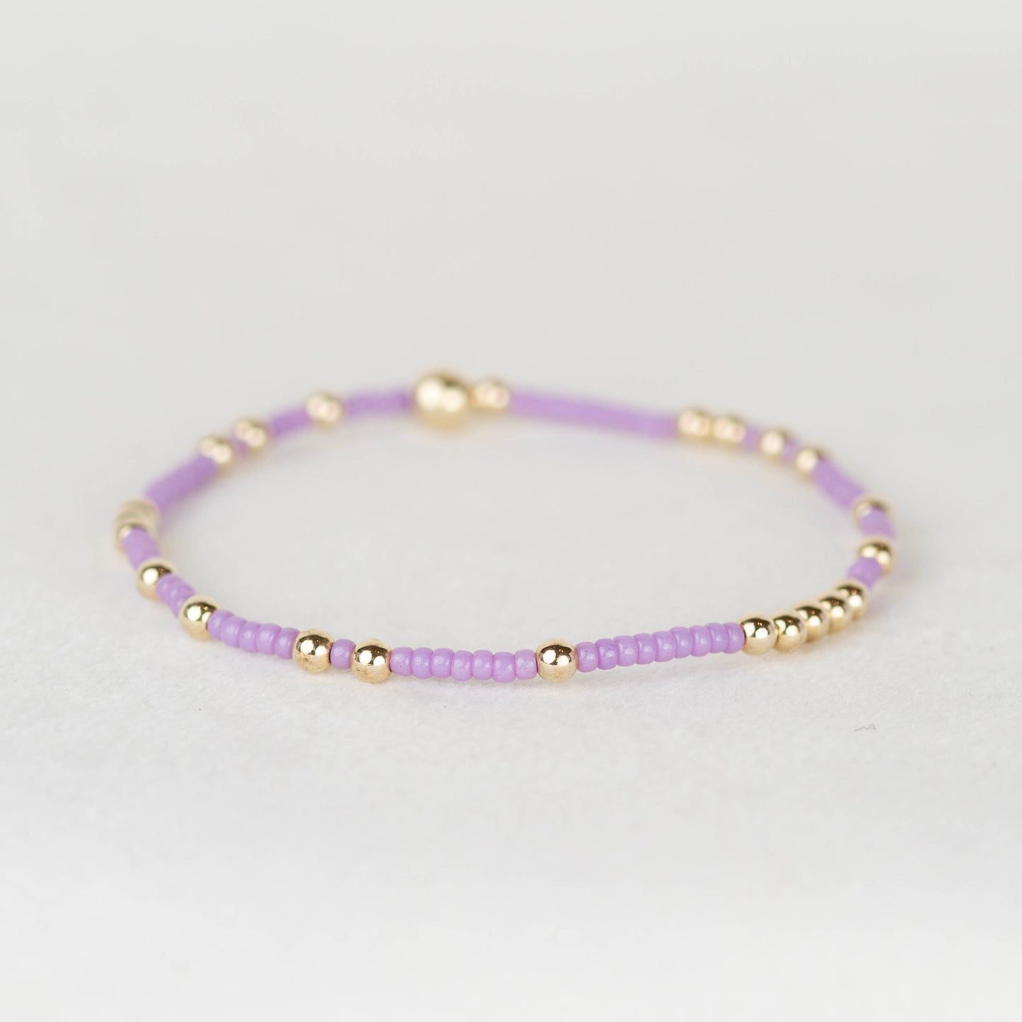 Lavender purple Olivia seed bead with scattered 14k gold filled or sterling silver beaded stretch bracelet 